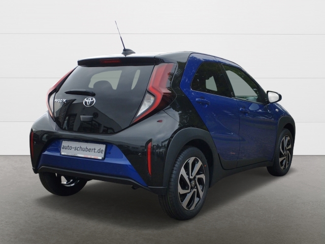 Foto 1 - Aygo X 1,0l Teamplayer+Sitzhzg+DAB+Rückfahrkamera+Spurhalteass., juniper blue (8y8)/ black mica (209) (blau)